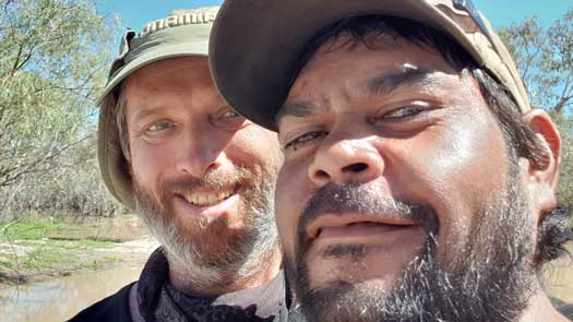 Selfie photo of two guys with beards