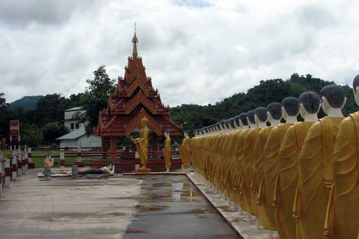 Statue beside temple