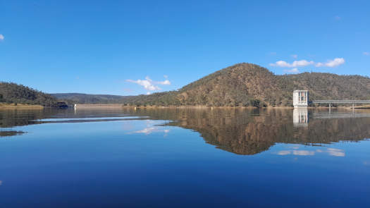 Lake under clear blue skies