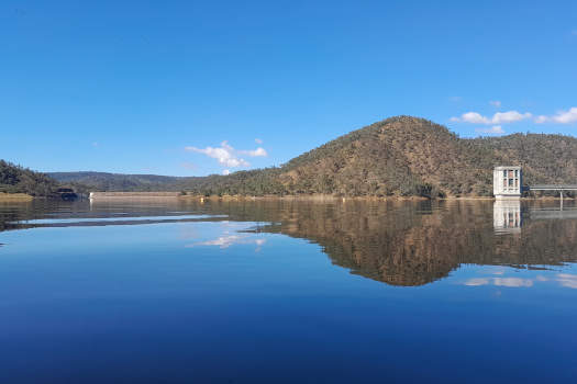 Lake under clear blue skies