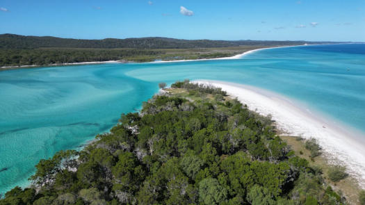 View from above of white sands and crystal blue water