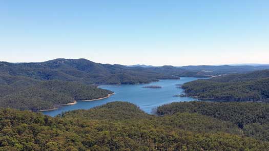 Lake under clear blue skies