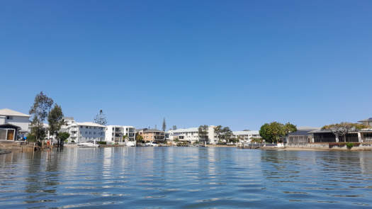 river lined by buildings