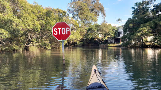 Sign in the middle of the water