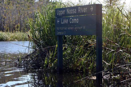 sign on river