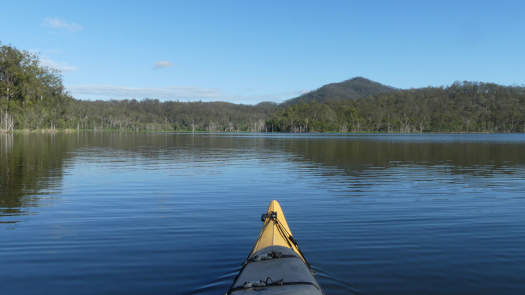 Lake under clear blue skies